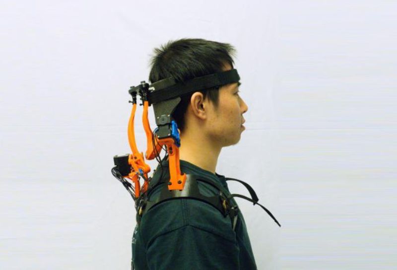 A study participant wearing the new robotic neck brace. Credit: Haohan Zhang and Sunil K. Agrawal/Columbia Engineering.
